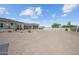 Circular driveway leading to a three-car garage for this home at 10448 E Glencove St, Mesa, AZ 85207