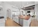 Spacious kitchen with an island, stainless steel appliances, and an open layout at 10448 E Glencove St, Mesa, AZ 85207