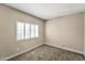 Cozy bedroom with plantation shutters allowing natural light at 10997 E Altadena Ave, Scottsdale, AZ 85259