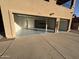 Spacious three-car garage with epoxy flooring, offering ample parking and storage space at 10997 E Altadena Ave, Scottsdale, AZ 85259