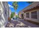 Desert landscaped yard with comfortable patio seating area, perfect for enjoying the outdoors in a private setting at 11144 N 109Th Way, Scottsdale, AZ 85259