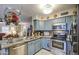 Modern kitchen featuring stainless steel appliances, granite countertops, and open layout, perfect for cooking and entertaining at 11144 N 109Th Way, Scottsdale, AZ 85259