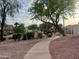 Manicured landscaping and walking path in this well-maintained community at 11144 N 109Th Way, Scottsdale, AZ 85259