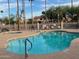 Sparkling community pool and spa with lounge seating at 11144 N 109Th Way, Scottsdale, AZ 85259