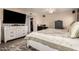 Comfortable main bedroom with tile floors, storage dresser, walk-in closet, and secure ProVault safe at 12548 E Cloud Rd, Chandler, AZ 85249