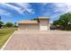 Detached multi-car garage with ample space for vehicles and storage at 12548 E Cloud Rd, Chandler, AZ 85249