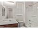 Bathroom featuring a sink, toilet, mirror, and bathtub with shower at 1268 E Jahns Dr, Casa Grande, AZ 85122