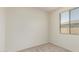 Carpeted bedroom with white walls and window with blinds allowing for plenty of natural light at 1268 E Jahns Dr, Casa Grande, AZ 85122