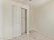 Neutral bedroom featuring carpet floors, closet with sliding doors and neutral paint at 1268 E Jahns Dr, Casa Grande, AZ 85122