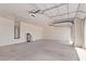 Spacious garage interior with water heater and water softener at 1268 E Jahns Dr, Casa Grande, AZ 85122