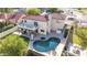 Aerial view featuring a swimming pool, hot tub, patio, and covered lounge area at 1349 N Lakeshore Dr, Chandler, AZ 85226