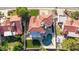 A bird's-eye view of the property with a sparkling pool, well-maintained landscaping and tiled roof at 1349 N Lakeshore Dr, Chandler, AZ 85226