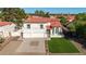 Stunning two-story home with lush lawn, and a three-car garage at 1349 N Lakeshore Dr, Chandler, AZ 85226