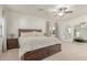 Inviting main bedroom featuring an adjacent bathroom and a private outdoor entry to a small balcony at 1349 N Lakeshore Dr, Chandler, AZ 85226