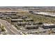 An aerial view displays a variety of shops, restaurants, and retail stores in an outdoor shopping center with ample parking at 14601 W Valentine St, Surprise, AZ 85379
