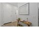 Bright entryway featuring a decor table, white door, and neutral walls at 14601 W Valentine St, Surprise, AZ 85379