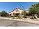 Commercial building with a unique barn-style exterior with beautiful landscaping at 14601 W Valentine St, Surprise, AZ 85379