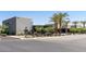 Modern building with palm trees; Eatery O.H.S.O Brewery at 14601 W Valentine St, Surprise, AZ 85379