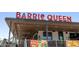 Barrio Queen restaurant exterior with vibrant signage, outdoor patio, and colorful decor at 14601 W Valentine St, Surprise, AZ 85379