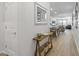 Bright hallway view leading into the kitchen, dining, and living areas at 14601 W Valentine St, Surprise, AZ 85379