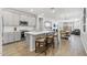 Modern kitchen featuring gray cabinets, a kitchen island, and stainless steel appliances at 14601 W Valentine St, Surprise, AZ 85379