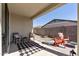 Cozy covered patio is perfect for relaxing with an outdoor living space at 14601 W Valentine St, Surprise, AZ 85379