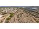 Aerial view of community, desert landscape, and surrounding roads; illustrating neighborhood layout and environment at 16010 N 74Th Ln, Peoria, AZ 85382