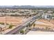 Aerial shot of road and city; showing the easy-access location of the property at 16010 N 74Th Ln, Peoria, AZ 85382