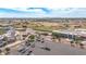 An aerial view of a commercial property featuring baseball fields, academic buildings, and ample parking spaces at 16010 N 74Th Ln, Peoria, AZ 85382