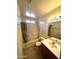 Bathroom featuring a vanity with sink, toilet, and tub-shower combination at 1836 N Stapley Dr # 88, Mesa, AZ 85203