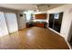 Bonus room with wood floors, natural light, and built-in cabinets with sink at 1836 N Stapley Dr # 88, Mesa, AZ 85203
