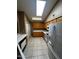 Cozy kitchen with ample wooden cabinets, appliances, and neutral countertops at 1836 N Stapley Dr # 88, Mesa, AZ 85203