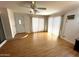 Bright living room with wood floors, ceiling fan, and lots of natural light at 1836 N Stapley Dr # 88, Mesa, AZ 85203