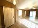 Bright living room features tiled floors, neutral walls, and sliding glass doors to the backyard at 1836 N Stapley Dr # 88, Mesa, AZ 85203