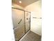 Shower with a tiled interior, grab bars, and glass sliding doors at 1836 N Stapley Dr # 88, Mesa, AZ 85203