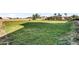 Large grassy backyard area, ideal for recreation and outdoor enjoyment at 18822 E Flintlock Dr, Queen Creek, AZ 85142
