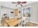 Bright dining room features wood table and light-colored walls at 18822 E Flintlock Dr, Queen Creek, AZ 85142