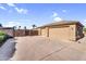 Spacious attached garage with ample parking and storage space at 18822 E Flintlock Dr, Queen Creek, AZ 85142