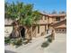 Beautiful two-story house with stucco siding, a tile roof, and mature landscaping at 1950 W Park Pl, Chandler, AZ 85224