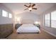 Spacious bedroom with high ceilings, neutral colors, and large windows at 1950 W Park Pl, Chandler, AZ 85224