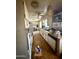 Functional kitchen with a microwave, and white cabinetry at 201 S Greenfield Rd # 23, Mesa, AZ 85206