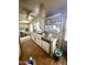 Functional kitchen with a microwave, and white cabinetry at 201 S Greenfield Rd # 23, Mesa, AZ 85206