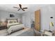 Cozy bedroom with a plush bed, stylish decor, and a view of the upstairs landing at 20274 N 76Th Way, Scottsdale, AZ 85255