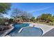 Serene pool area surrounded by lush desert landscaping and mature trees at 20274 N 76Th Way, Scottsdale, AZ 85255