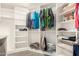 Spacious walk-in closet with custom shelving and ample storage space for clothes and accessories at 20427 N 88Th Dr, Peoria, AZ 85382