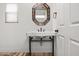 Charming bathroom features a unique mirror and modern sink design at 20802 N Grayhawk Dr # 1123, Scottsdale, AZ 85255