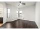Bright bedroom with dark wood floors and ample natural light at 20802 N Grayhawk Dr # 1123, Scottsdale, AZ 85255