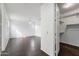 Spacious bedroom showcasing dark wood floors and a walk-in closet at 20802 N Grayhawk Dr # 1123, Scottsdale, AZ 85255