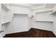Walk-in closet offering custom shelving and ample storage space at 20802 N Grayhawk Dr # 1123, Scottsdale, AZ 85255