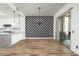 Modern dining area with chandelier and sliding door at 20802 N Grayhawk Dr # 1123, Scottsdale, AZ 85255